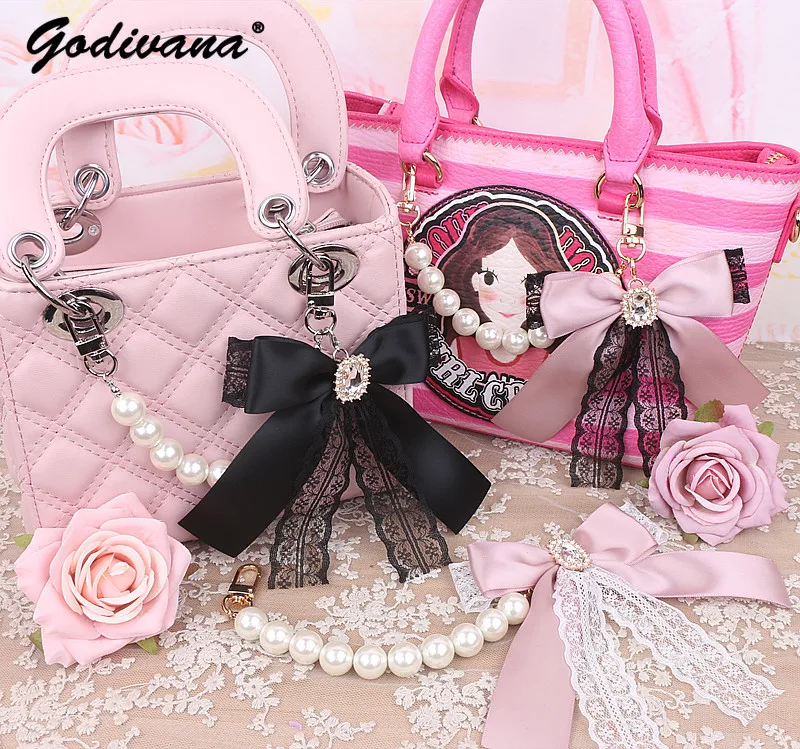 Top Trends: Handmade Japanese Style Lace Rhinestone Big Bow Stringed Pearls Handbag Pendant Sweet Cute Female Lace Bowknot Bag Charms Shoppable Styles