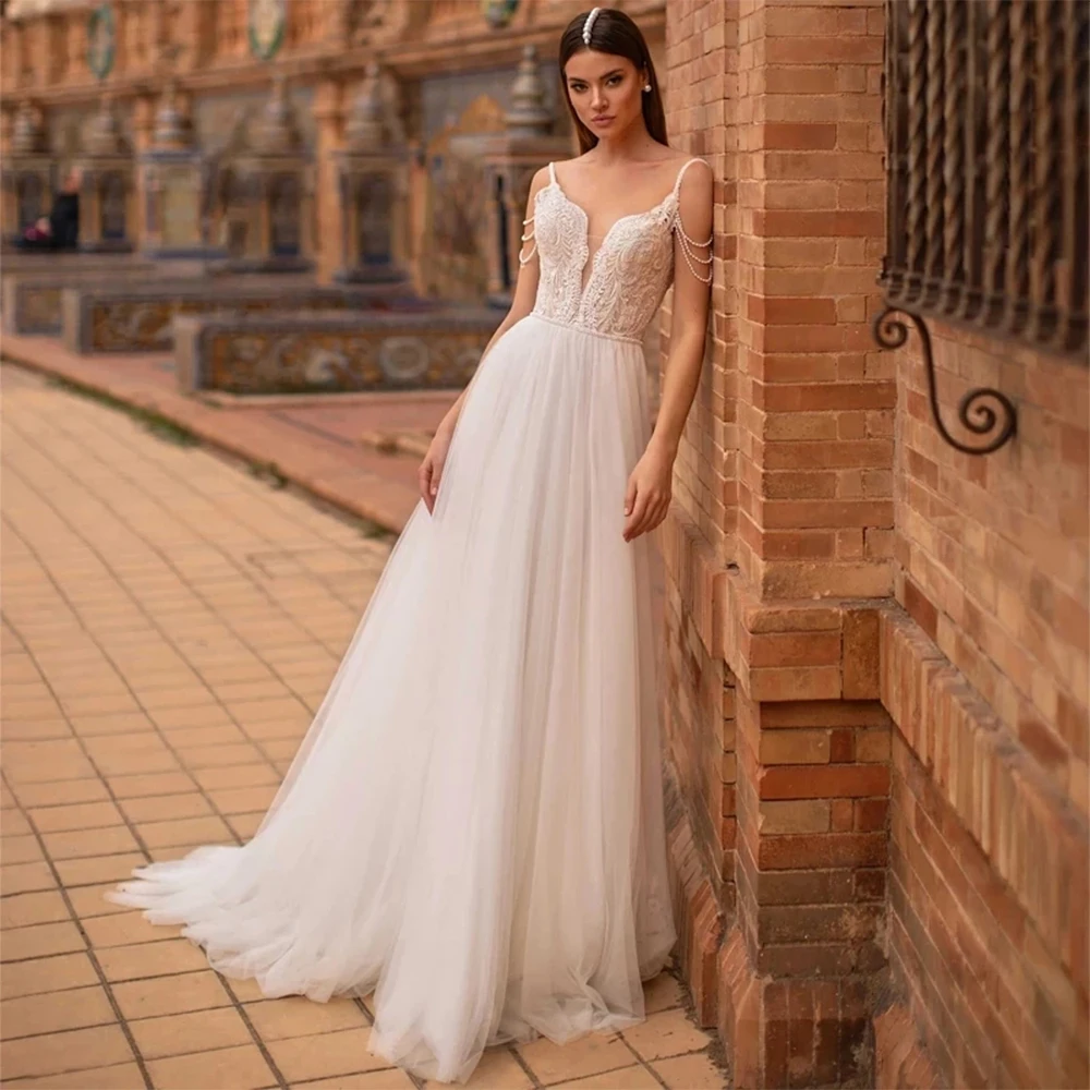 Top Trends: Elegant A-line Backless Wedding Dress 2023 Lace Embroidered Pearl Suspenders White Tulle Buttons Beaded Floor-Length Bridal Gown Shoppable Styles