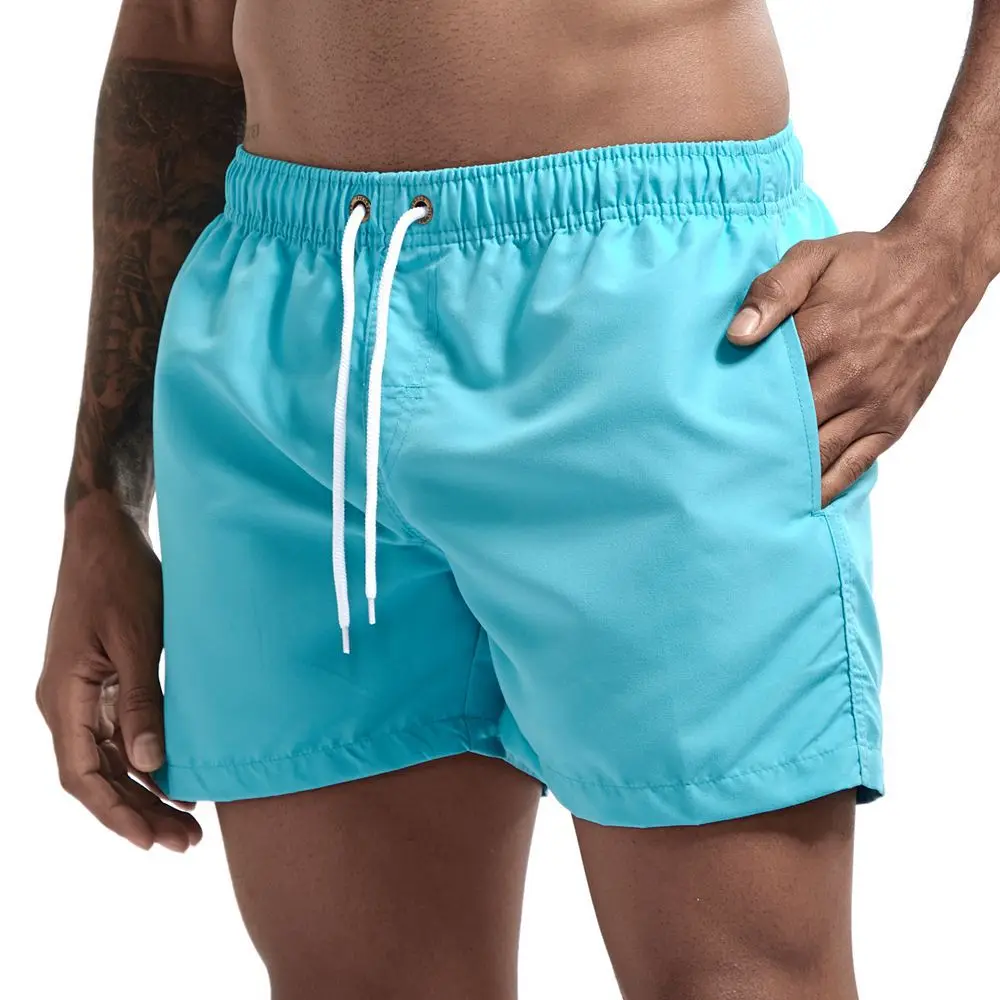 Top Trends: Summer Men's Beach Shorts Fashion Solid Pocket Shorts Fitness Quick Dry Swimwear Beach Drawstring Breechcloth Bottoms Shoppable Styles