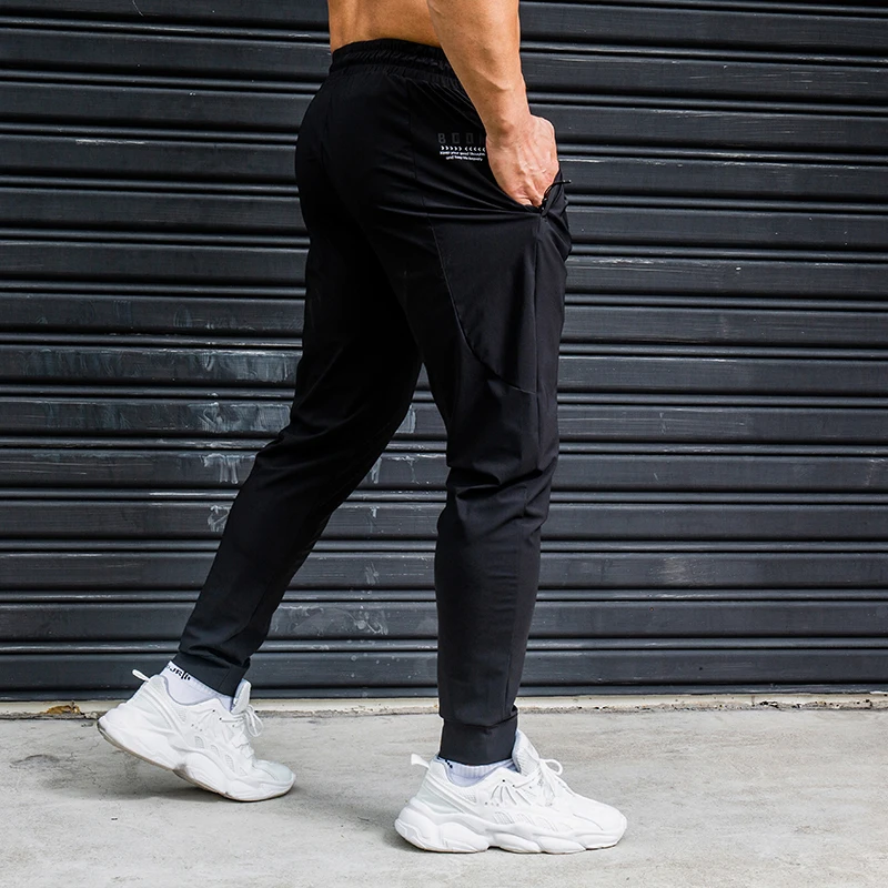 Top Trends: Elasticity Men Running Pants Casual Sweatpants With Zipper Pockets Training Jogging Fitness Trousers Gym Workout Sport Pants Shoppable Styles - Image 2