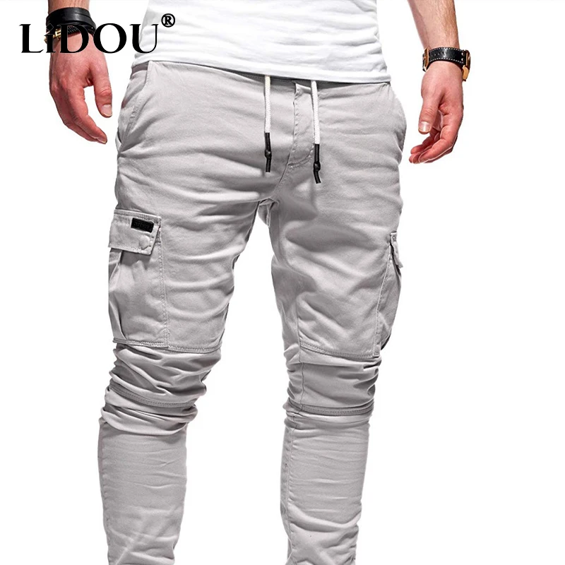 Top Trends: 2023 Spring Autumn New Elastic Waist Pockets Drawstring Pencil Pants Man Fashion Motion Comfortable All-match Running Trousers Shoppable Styles