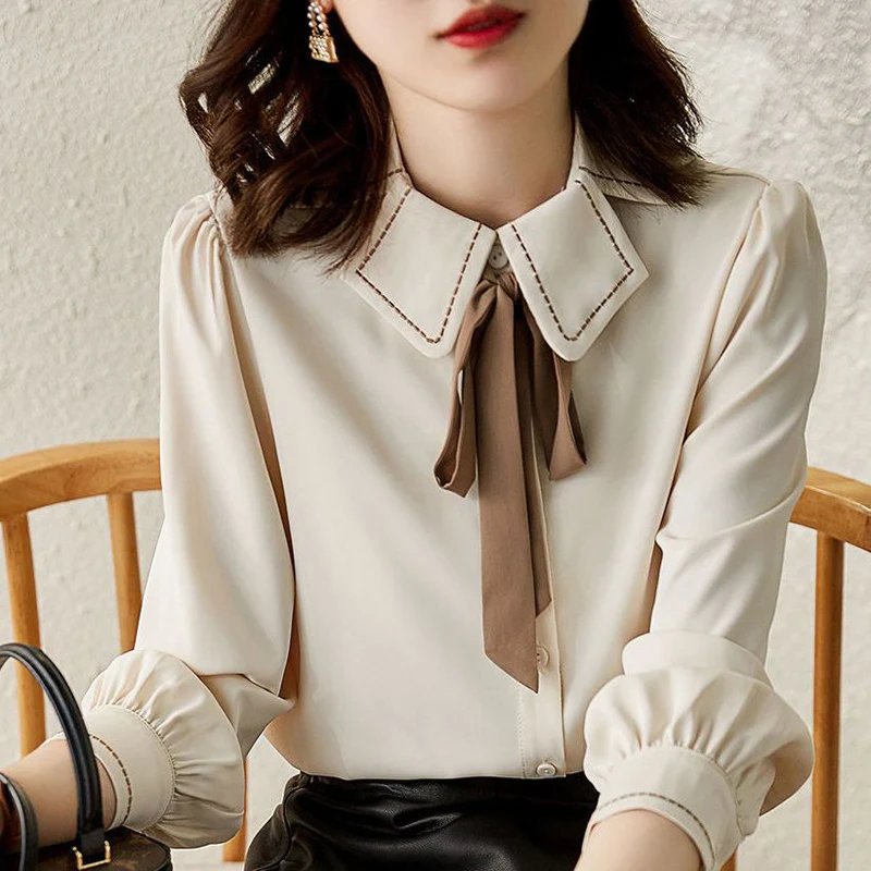 Top Trends: Elegant Lapel Solid Color Korean Lace Up Bow Shirts Women&#039;s Clothing 2023 Autumn Winter Loose All-match Tops Office Lady Blouses Shoppable Styles