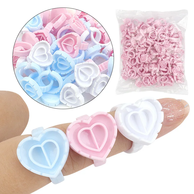 Top Trends: Glue Rings Disposable 100pcs New Heart Shape Eyelash Extension Finger Holder Rings Cup For Eyelashes Extension Tattoo Pigment Shoppable Styles