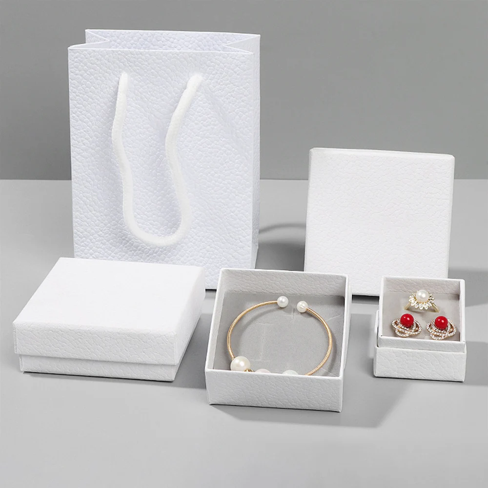 Top Trends: Lychee Pattern Imitation Leather Jewelry Box White Square Earrings Pendant Box Display For Wedding Gift Jewelry Packaging Case Shoppable Styles