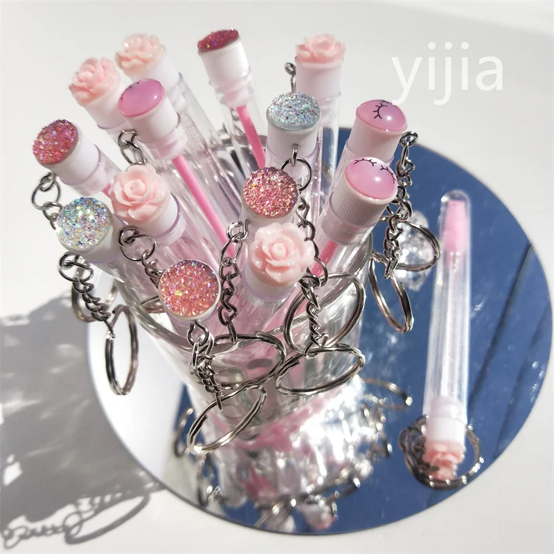 Top Trends: 5pcs Reusable Eyelash Brush Tube Keychain Plastic Portable Lash Comb Spoolie Container Glitter Cils Mascara Wands Keyring Shoppable Styles