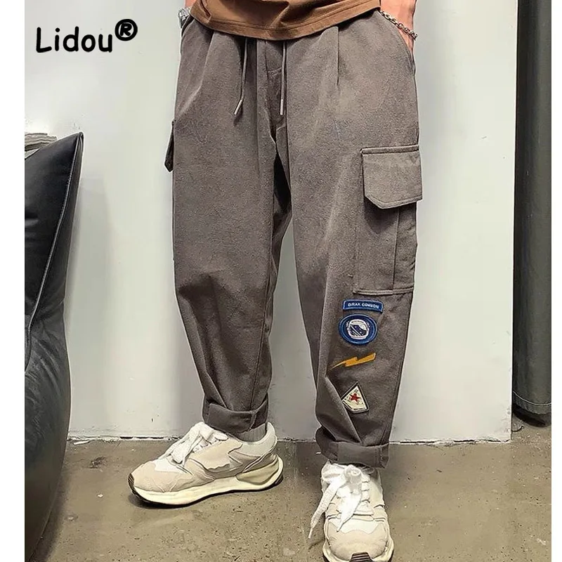 Top Trends: Fashion Embroidered Multiple Pockets Men's Cargo Pants New Loose Straight Cylinder Waist Drawcord Street Casual Trousers 2023 Shoppable Styles