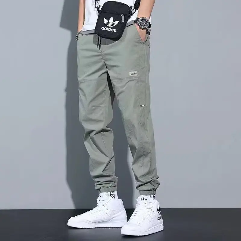 Top Trends: Casual Ventilate Patch Solid Color Men's Cargo Pants Classic Waist Drawstring Street Casual All-match Tie One's Feet Trousers Shoppable Styles - Image 3