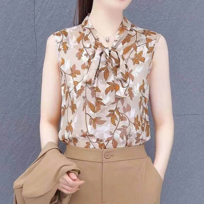 Top Trends: Elegant V-Neck Printed Loose Lace Up Bow Chiffon Blouse Women Clothing 2023 Summer New Casual Pullovers Sleeveless Korean Shirt Shoppable Styles