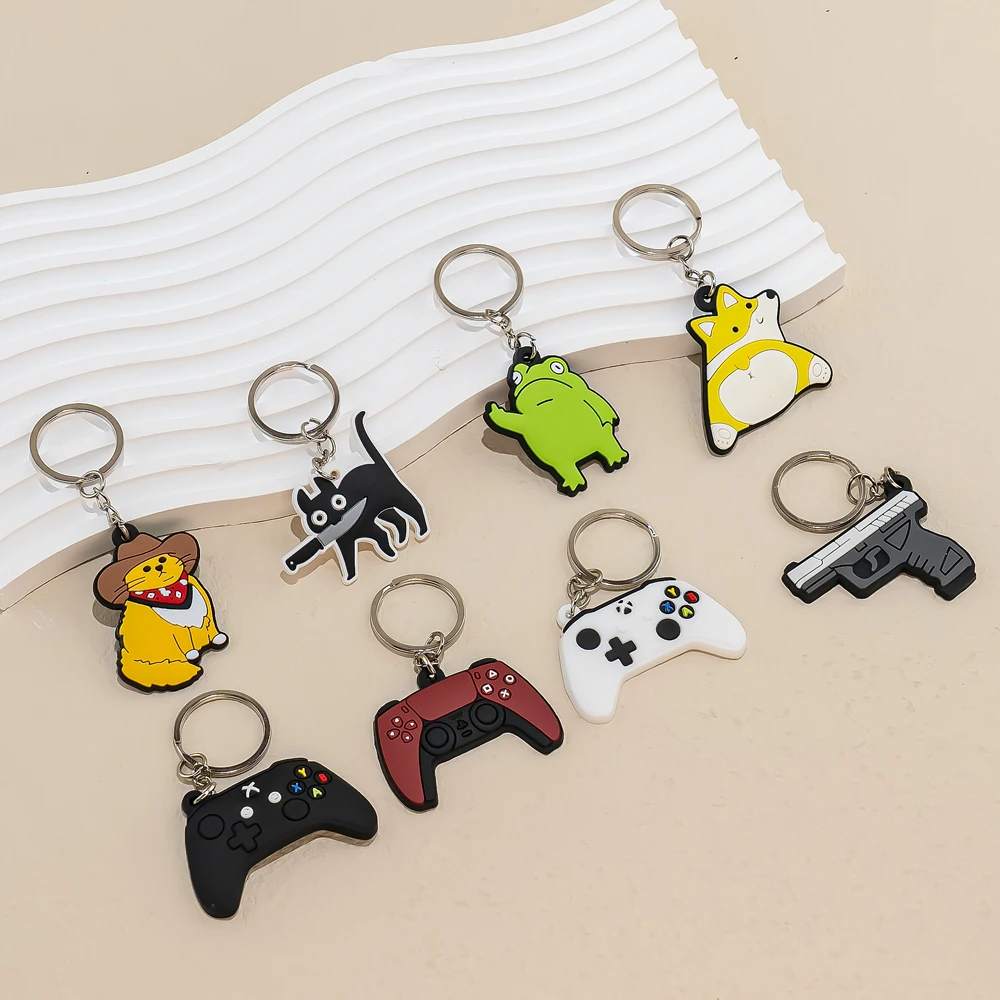 Top Trends: 1PCS PVC Key Chain Fashion Joystick Anime Figure Cute Animal Cats Keychain Peel Frogs Car Key Rings Kids Favor Birthday Gift Shoppable Styles