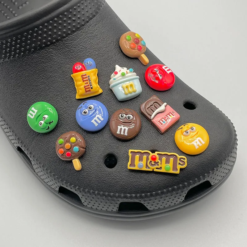 Top Trends: Funny Letter M Bean Shoe Decorations Croc Jeans Fit Cute Candy Shoe Charms Pins For Crocs Child's Slippers Accessories Kids Gift Shoppable Styles