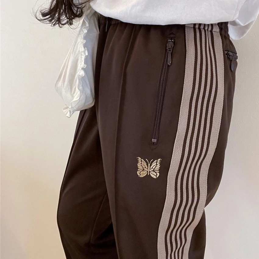 Top Trends: Brown AWGE Needles Pants Men Women 1:1 High Quality White Stripe Needles Track Pants Embroidered Butterfly Staight Trousers Shoppable Styles