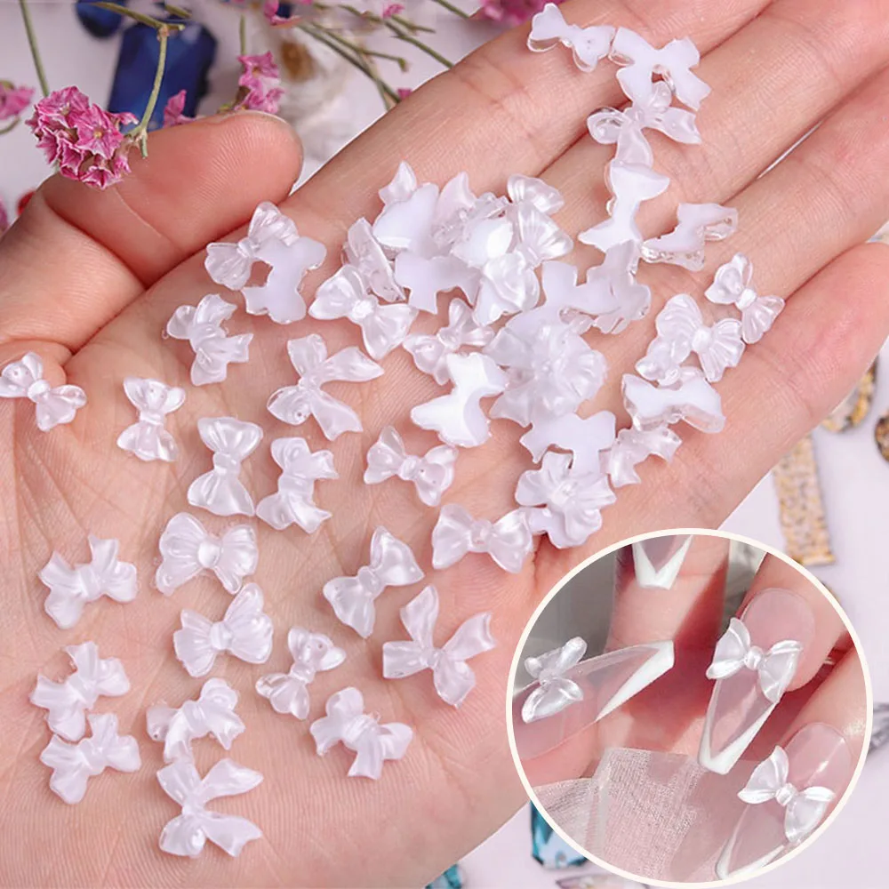 Top Trends: 100Pcs Ice Transparent Bow 10*11mm Resin Bowknot Nail Art Decor DIY 3D Cute Kawaii Ice Ribbon Manicure Accessories ZCF-1M5HY Shoppable Styles