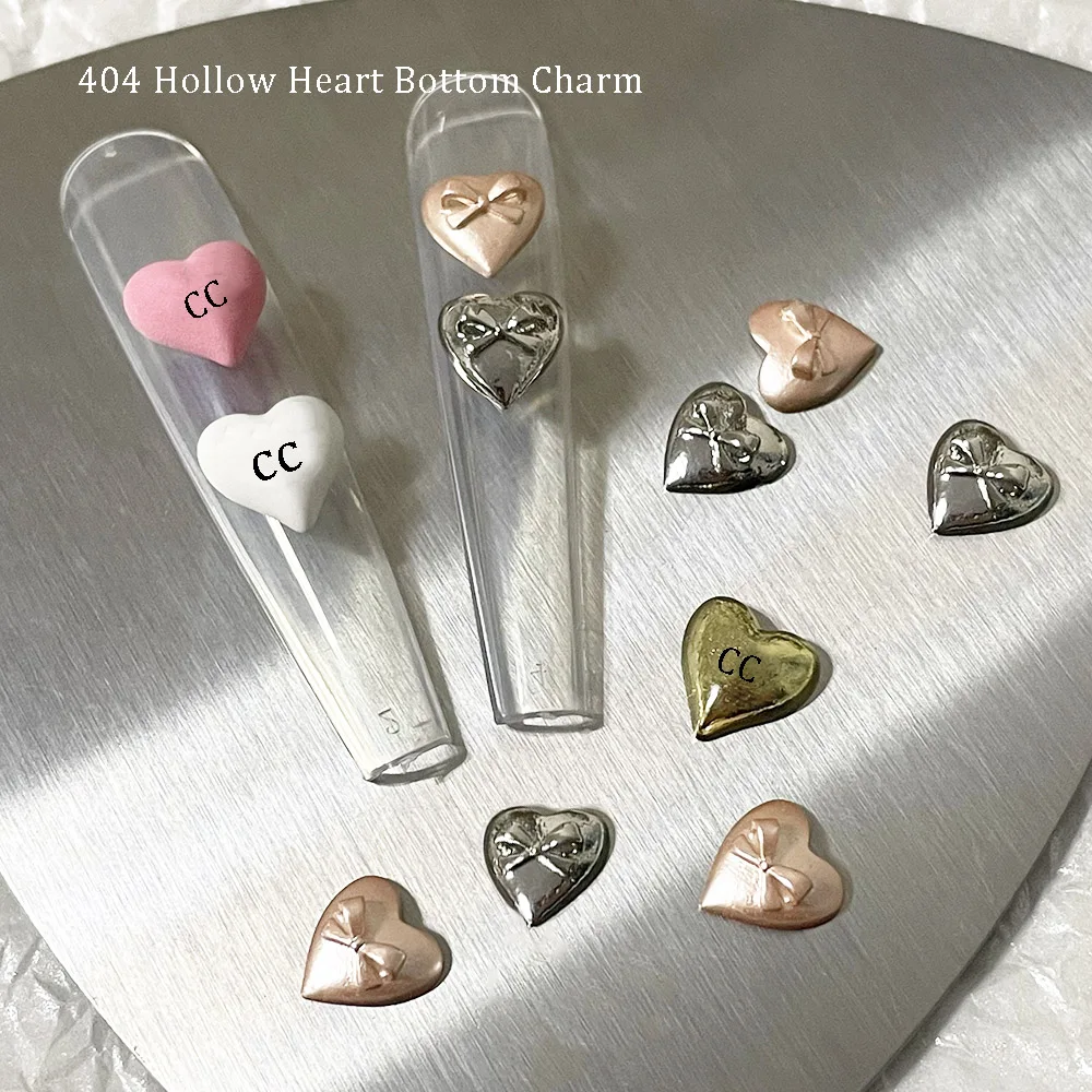 Top Trends: 10pcs CC Luxury Design Heart Charms Elegant Bowknot Heart Silver Metal Alloy Hollow Bottom Oil Spray Nail Tip Accessories 404art Shoppable Styles