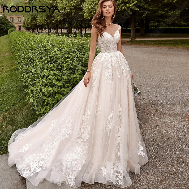 Top Trends: RODDRSYA Beach Cap Sleeves Wedding Dresses Illusion Lace Buttons Back Bridal Gown Women Appliques Tulle Vestidos De Novia Playa Shoppable Styles