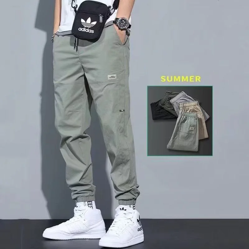 Top Trends: Casual Ventilate Patch Solid Color Men's Cargo Pants Classic Waist Drawstring Street Casual All-match Tie One's Feet Trousers Shoppable Styles - Image 2