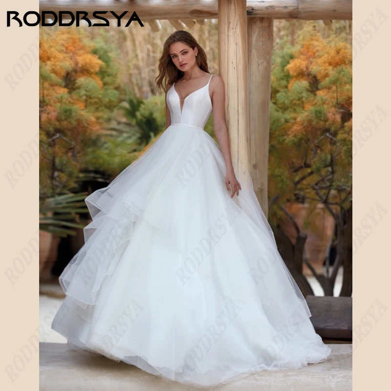 Top Trends: RODDRSYA Spaghetti Straps Wedding Dresses V-Neck Satin A-Line Bridal Gowns Tulle Lace Backless Beach Bride Party Robe De Mariée Shoppable Styles