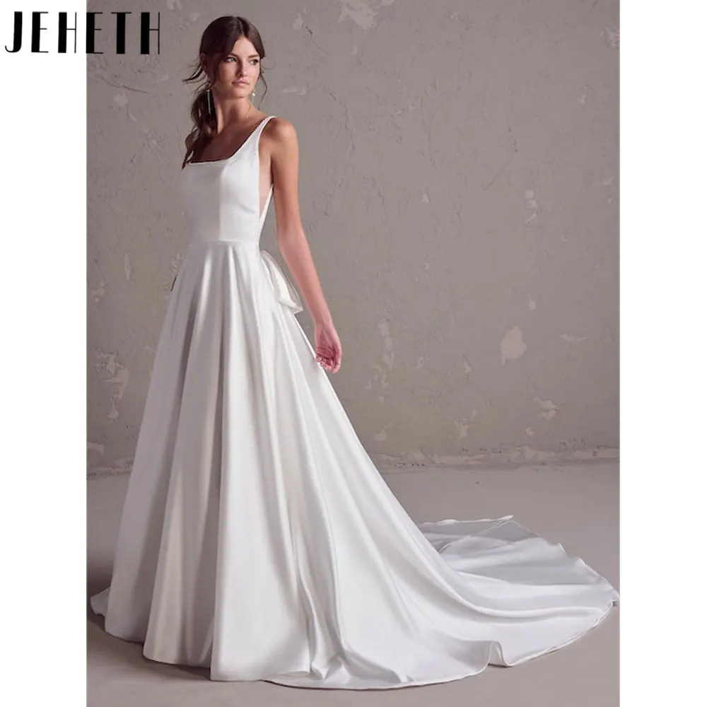 Top Trends: JEHETH Square Neck Satin Sleeveless Wedding Gowns White Satin Backless Bridal Dresses Back Bow Spaghetti Straps Robes De Mariée Shoppable Styles