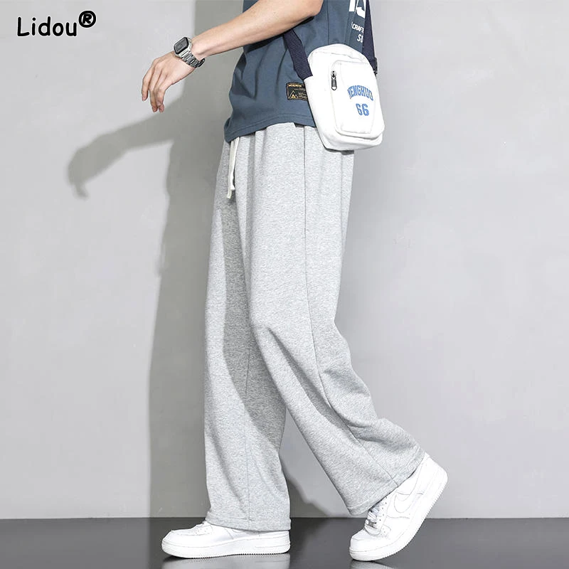 Top Trends: Casual Sports Comfortable Simplicity Loose Spring Summer Man Wide Leg Pants Pockets Solid Color New Lacing 2023 Men's Clothing Shoppable Styles