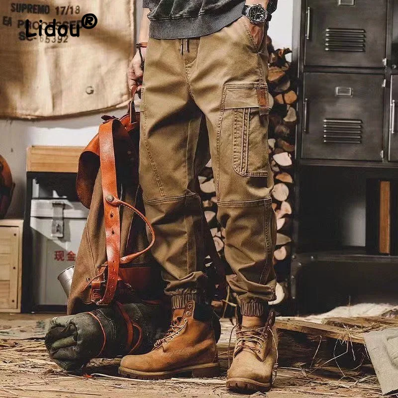 Top Trends: Vintage Fashion Multiple Pockets Tie One&#039;s Feet Men&#039;s Cargo Pants New Waist Drawcord Street Casual Male All-match Trousers Shoppable Styles