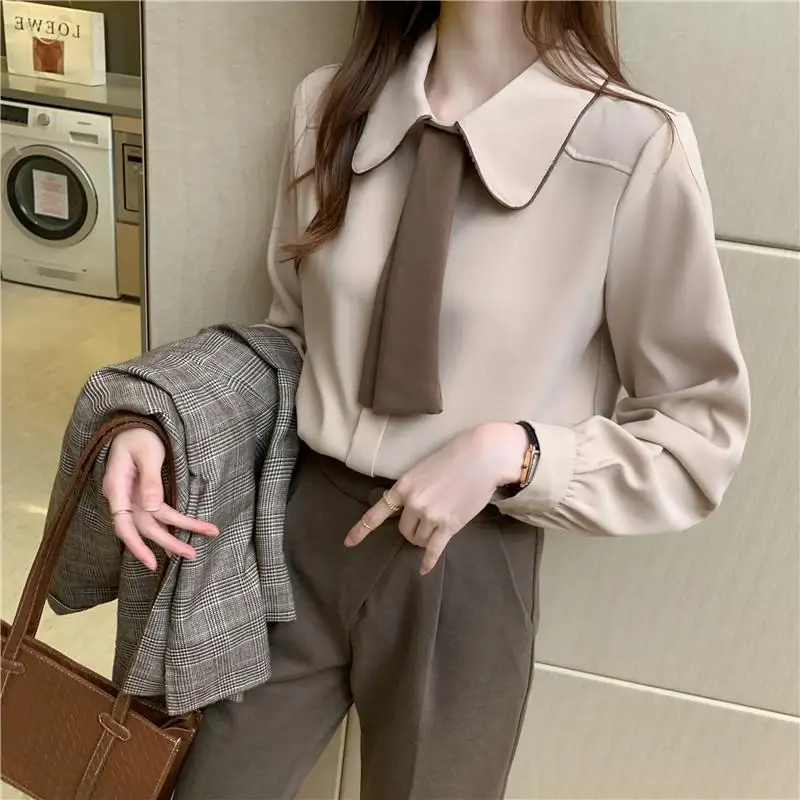 Top Trends: Stylish Lapel Button Spliced Loose Lace Up Korean Shirt Female Clothing 2023 Spring New Casual Tops All-match Office Lady Blouse Shoppable Styles