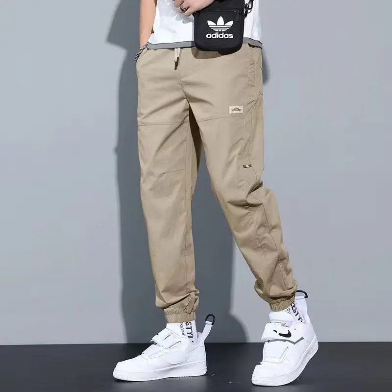 Top Trends: Casual Ventilate Patch Solid Color Men's Cargo Pants Classic Waist Drawstring Street Casual All-match Tie One's Feet Trousers Shoppable Styles - Image 5