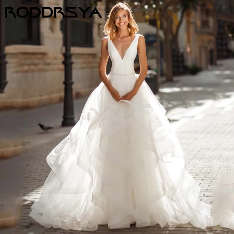 Top Trends: RODDRSYA Sexy V-Neck Backless A-line Wedding Dress Romantic Organza Sleeveless Trouwjurk Simple Spaghetti Straps Bride Party Shoppable Styles