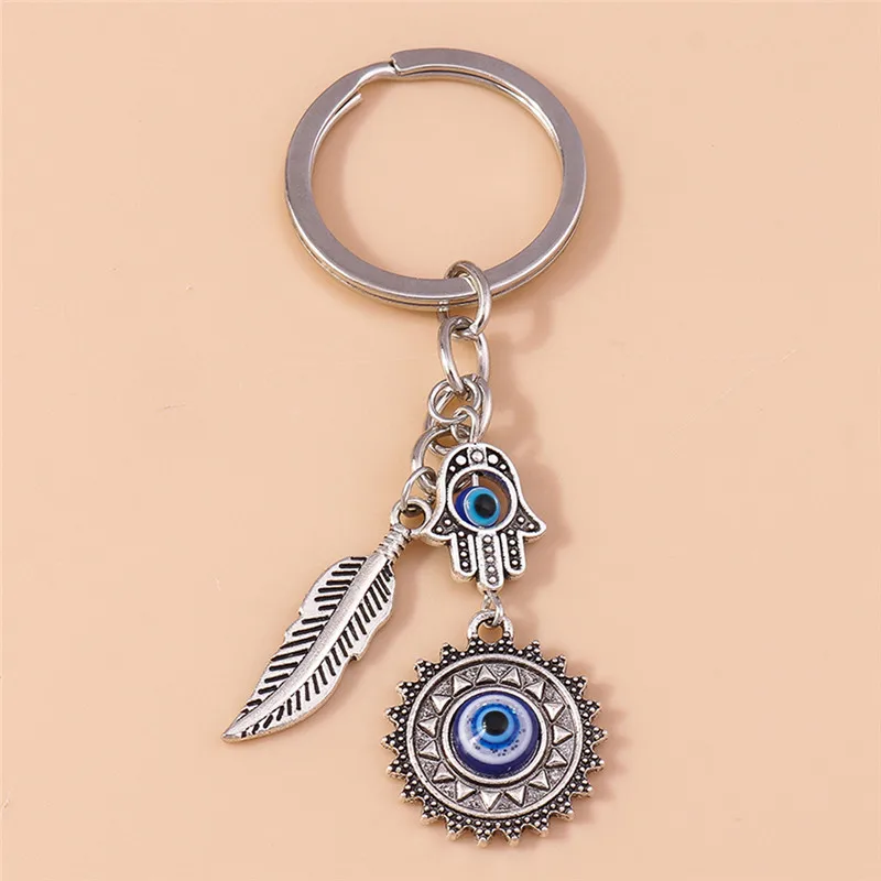 Top Trends: 1Pc Bohemia Evil Eye Hamsa Hand Keychain For Women Men Blue Eye Sun Feather Key Ring Bag Pendant Car Key Holder Rings Wholesale Shoppable Styles