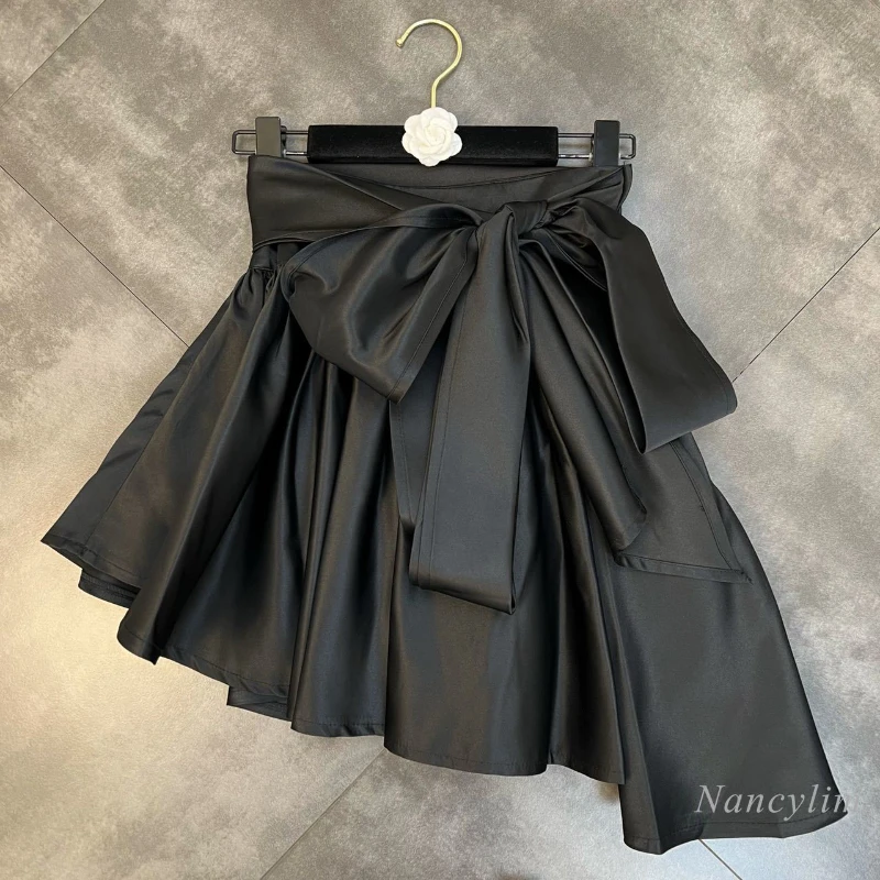 Top Trends: Irregular Skirt Women 2024 Spring Waist Big Bow Tie Pleated Puffy Jupe Femme Fashion Streetwear Ladies Clothes Black Mini Shoppable Styles