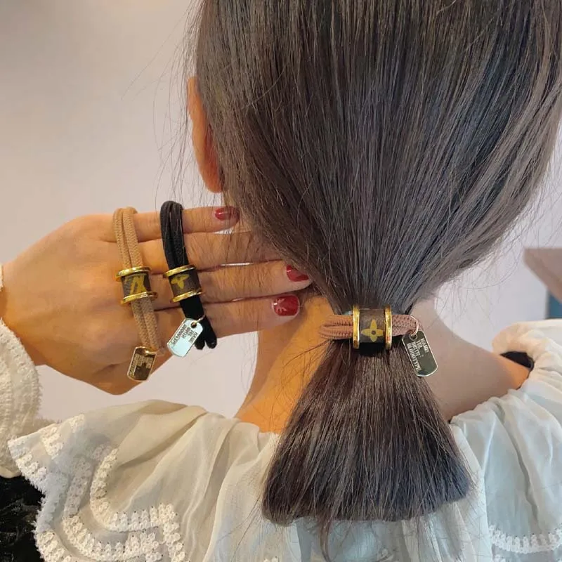 Top Trends: Metal Ring Pendant Hair Rope Girl High Elastic Rubber Band Low Horse Tail Fixed Hair Bands Bracelet Head Rope Fashion Headwear Shoppable Styles