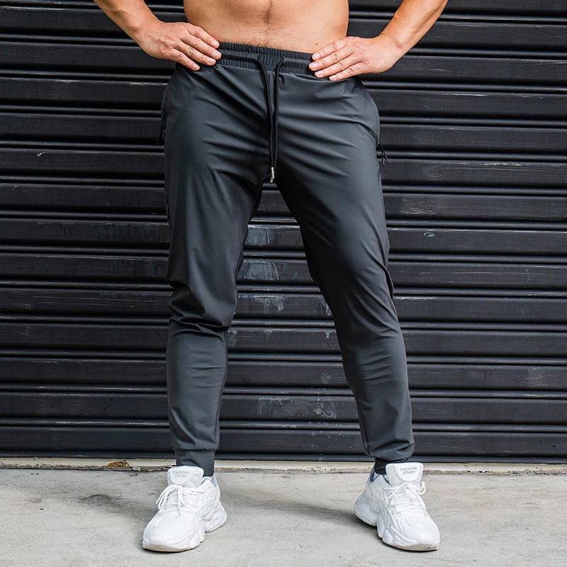 Top Trends: Elasticity Men Running Pants Casual Sweatpants With Zipper Pockets Training Jogging Fitness Trousers Gym Workout Sport Pants Shoppable Styles - Image 4