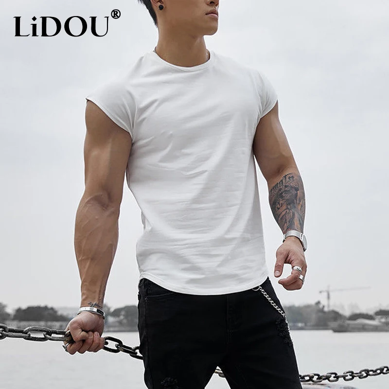 Top Trends: Fashion Loose Sleeveless Men's Clothing 2023 Summer New Solid Color Cotton Round Neck Vest Motion Bodybuilding Quick Drying Tops Shoppable Styles