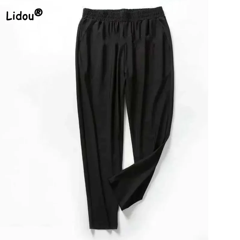 Top Trends: Plus Size Ice Floss Trousers Women's Fashion All-match Patchwork Pockets Loose Elastic High Waist Nine Points Black Harem Pants Shoppable Styles