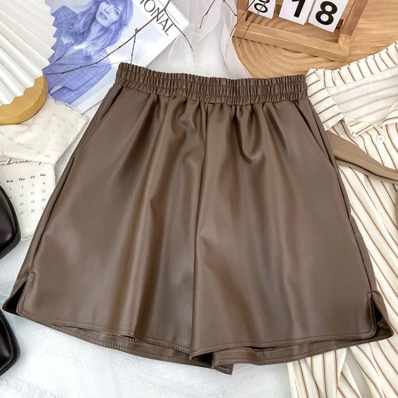 Top Trends: Women's Solid Elastic Waist Ruched Pocket Wide Leg 2023 Autumn And Winter High Waited Loose Fashionable All Match Leather Shorts Shoppable Styles