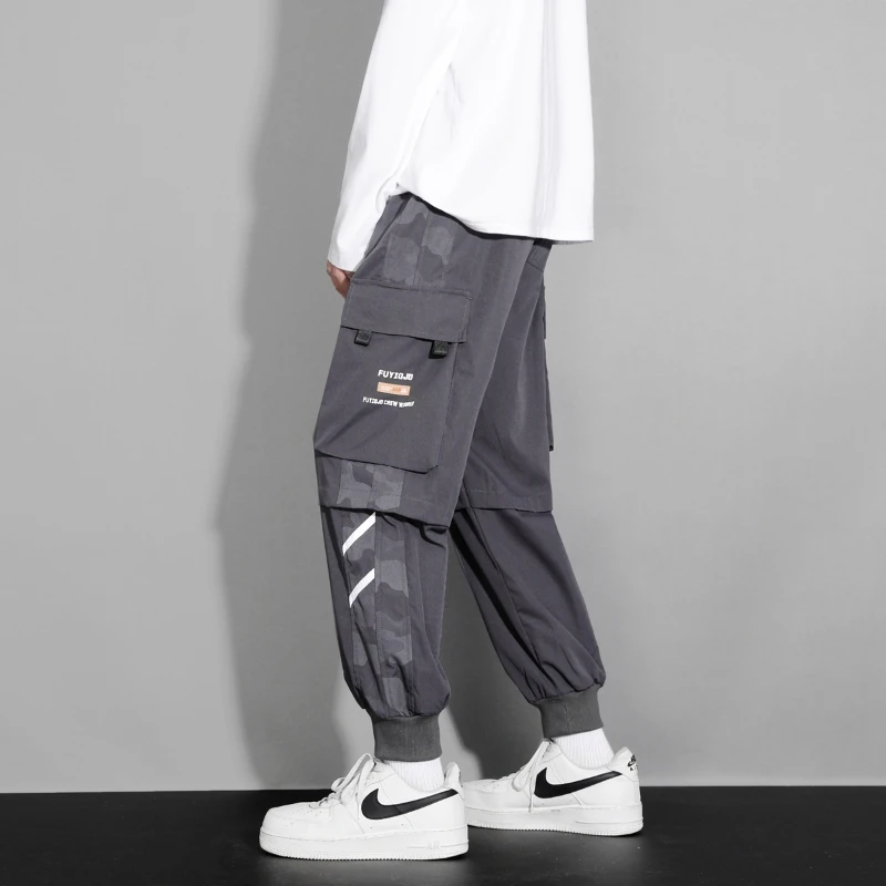 Top Trends: 2024 New Men&#039;s Autumn And Winter Elastic Waist Drawstring Multi Pocket Solid Color Loose Tie Feet Work Wear Sports Casual Pants Shoppable Styles