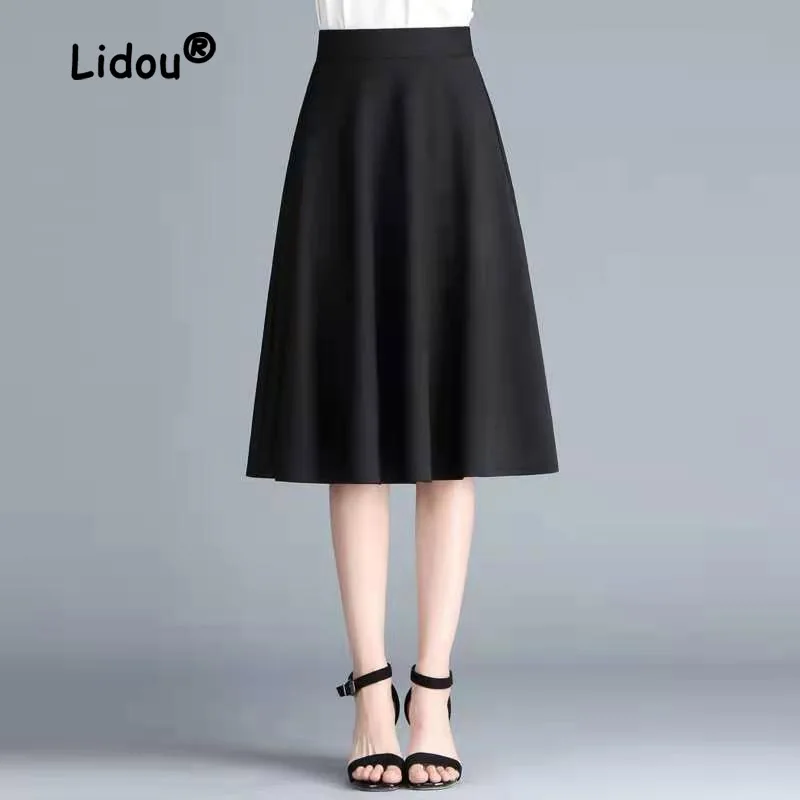 Top Trends: Skirt New Classic Solid Color Elastic Loose Large Waist Slim Mid Length A-line Women&#039;s Office Versatile Half Length Skirt Shoppable Styles