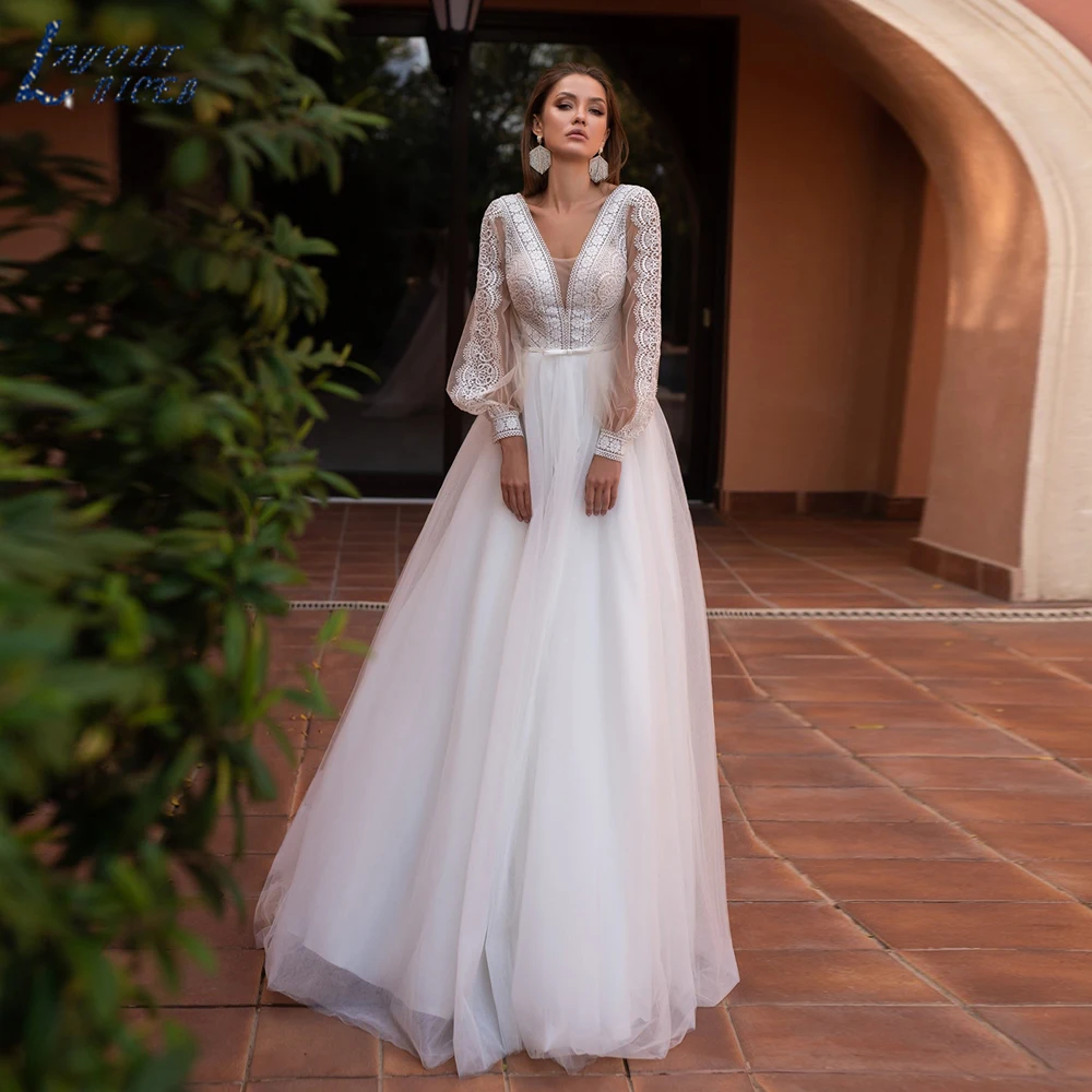 Top Trends: LAYOUT NICEB Elegant Long Sleeve Wedding Dresses 2023 Lace V Neck Beach For Bridal Dress Tulle Sweep Train Backless Bride Gowns Shoppable Styles