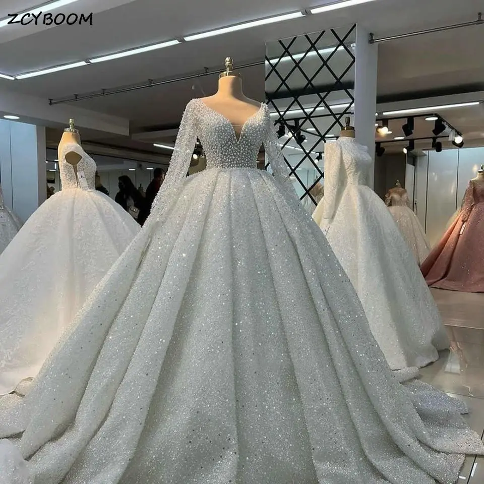 Top Trends: Luxury Pearls Beaded Illusion Ball Gown Wedding Dresses 2023 Arabic Dubai Tulle V-Neck Long Sleeves Bride Gowns Vestido De Noiva Shoppable Styles